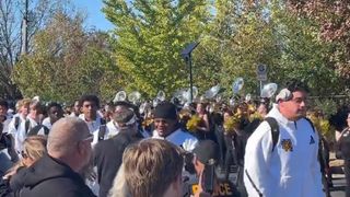 Brian Bohannon, controversially fired earlier this week, quietly crashed the pregame walk to support all his former players (Kennesaw State)