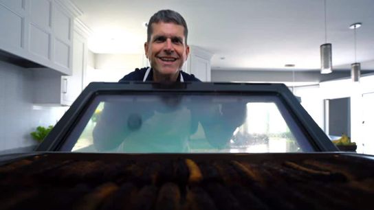 Jim Harbaugh and his wife star in milk commercial, and Jim "refuses to drink candy-ass skim milk" (Urban Meyer)