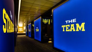 Michigan reveals new locker room that perfectly balances their tradition with modern amenities players expect (locker room)