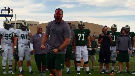 Strength coach gets them fired up (strength)