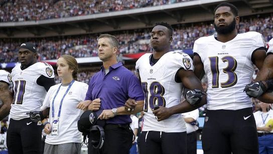 Ravens locked arms