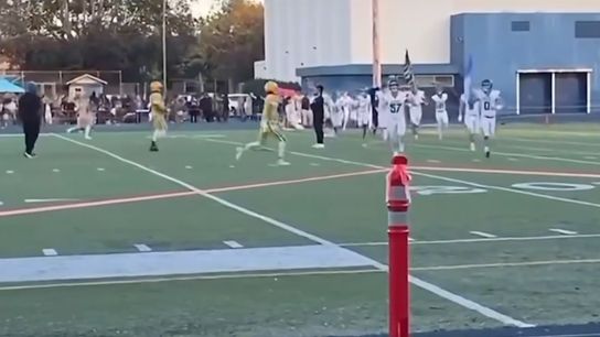 Video: High school player tees off on rival carrying American flag onto field (high school)