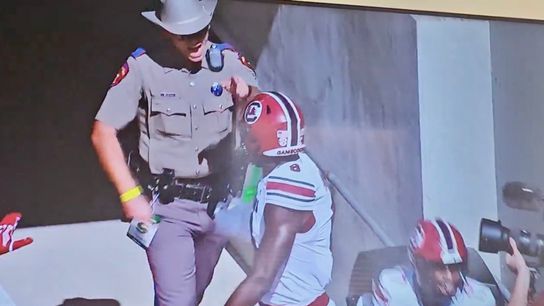 Watch Texas cop bump South Carolina player, Texas A&M police respond (Featured)