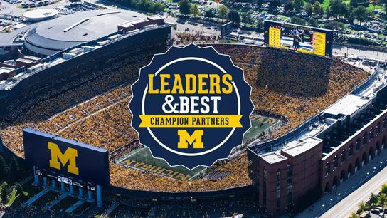Michigan reaches $1.2 million settlement with woman who accused former football staffer of rape (Michigan Football)