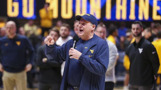 Rich Rod signs West Virginia contract, with an unique clause