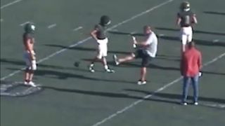 High school coach fired after video goes viral of him kicking ball into player's groin (Featured)