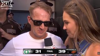 Eric Morris near tears after Oklahoma State's stunning upset of No. 6 Oregon (Oklahoma State Football). Photo by ESPN
